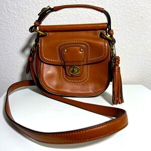 Coach Leather Mini Willis Royal Brown Cognac
Cross Body & Tassel Bag